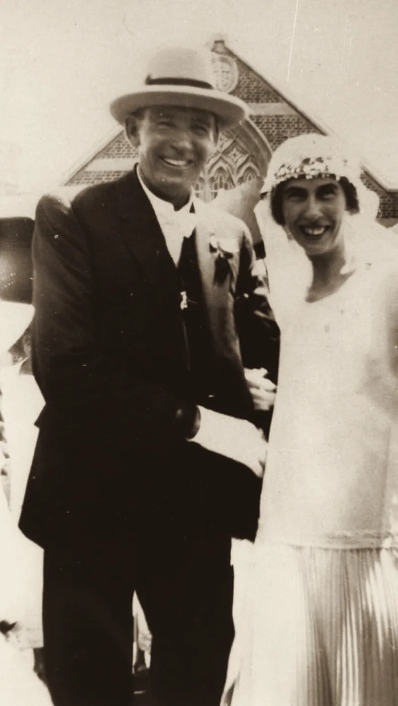 Happy smiles from the new bride and groom, c. 1920. An archive photograph.