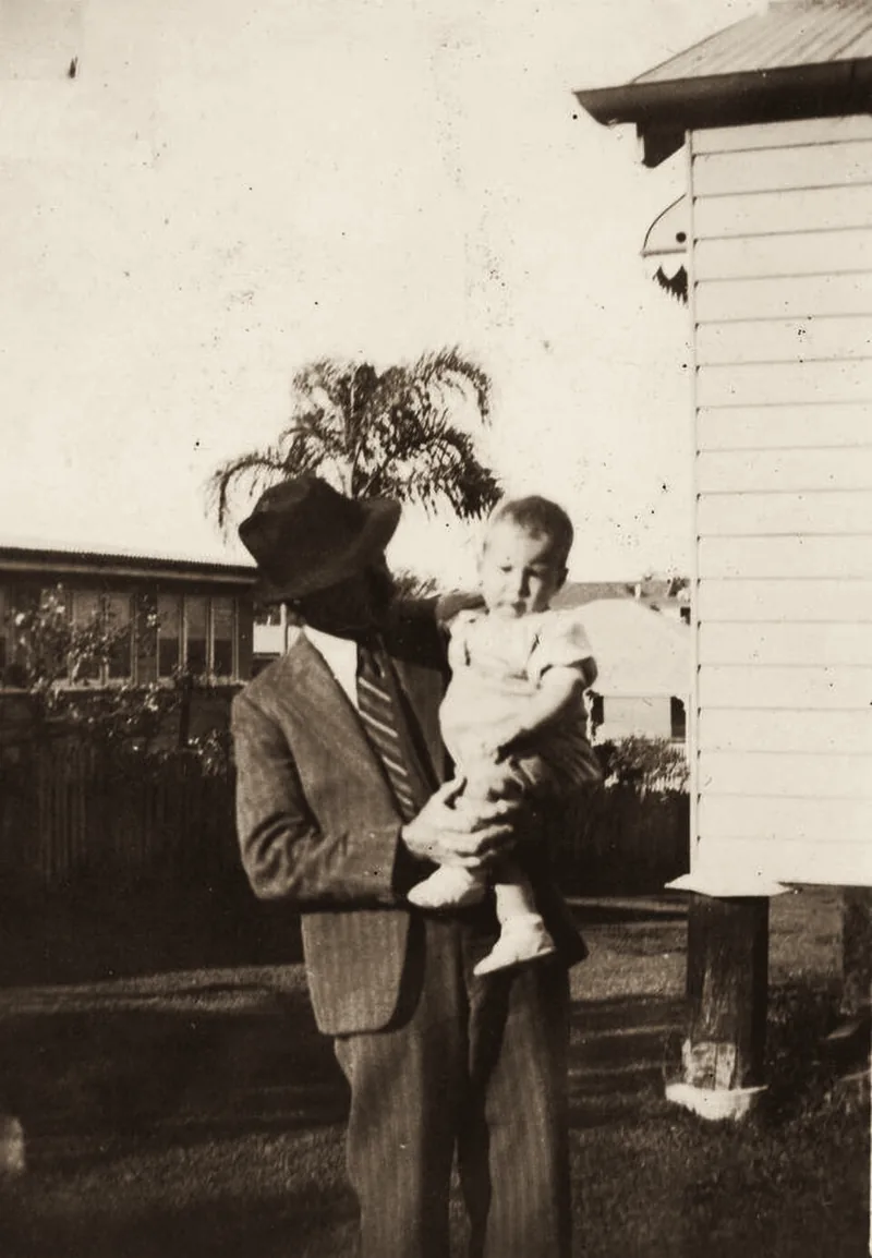 Jerry Palmos and his baby son Denny, East Brisbane, c. 1937. An archive photograph.