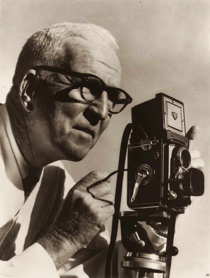 William Sneyd with his Rolleiflex camera, c. 1940. An archive photograph.